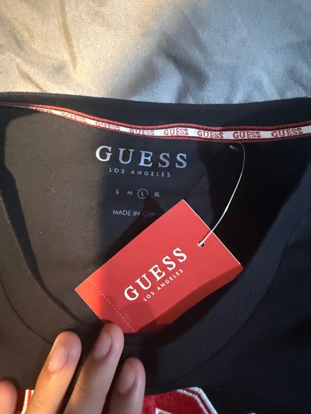 GUESS Black Short-Sleeve Tee with Red Logo Crest - Picture 2 of 5